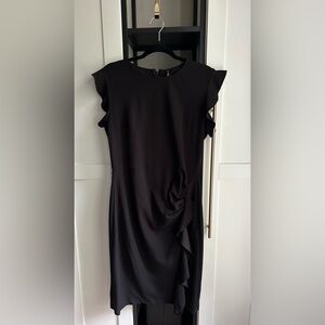 Black mid-length dress. By Miusol size XL.